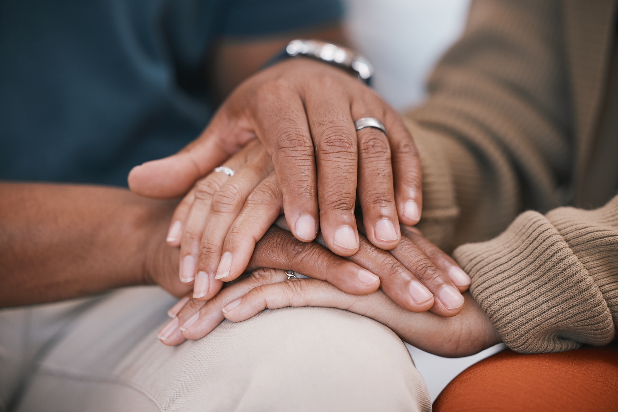 Hands of couple in therapy for marriage counselling, support and love with relationship advice. Tru